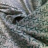 "Luxurious Brocade Fabric: A close-up view of our intricately woven Brocade textile, showcasing elegant patterns and raised textures. Perfect for upscale fashion and refined home decor projects, this fabric exudes timeless charm. Explore the sophistication and craftsmanship in every thread. #BrocadeFabric #LuxuryTextiles #TimelessElegance"